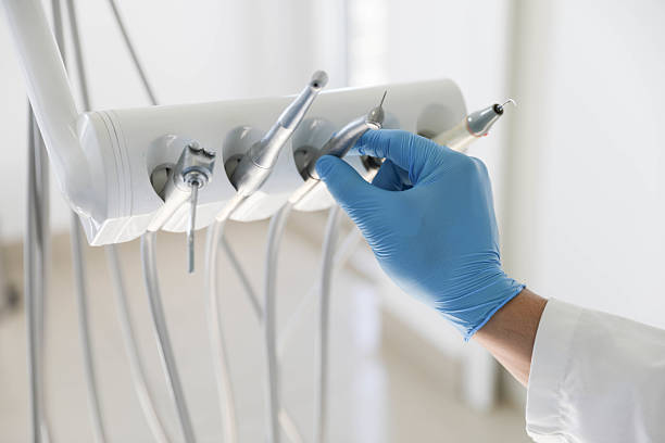Professional Tooth Extraction technician working in Cache, OK